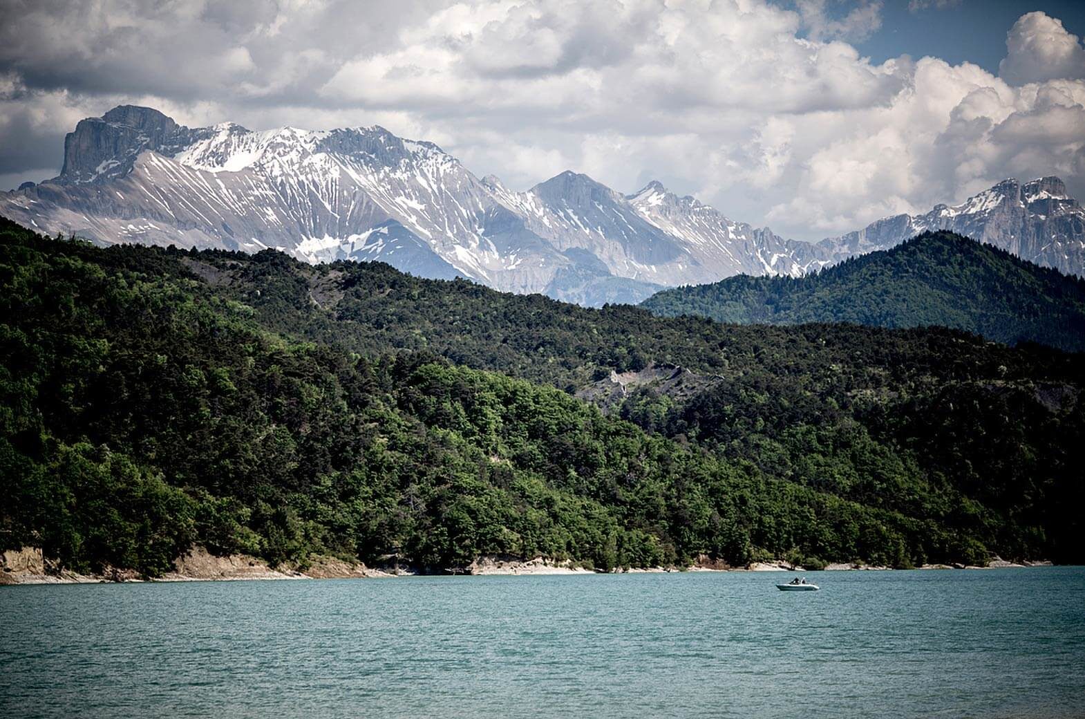 view from a lake and mountains near Grenoble